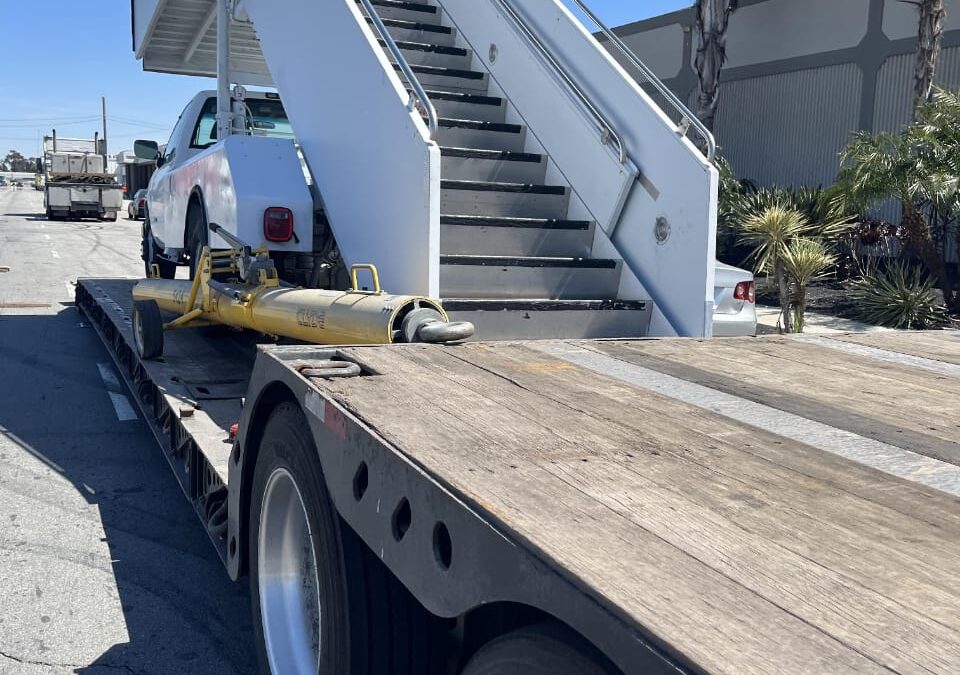 Stair truck and towbar on RGN