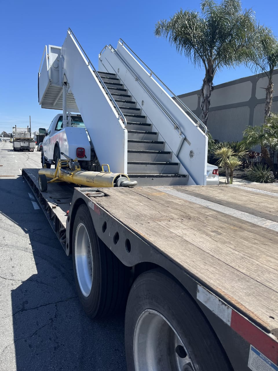 Stair truck and towbar on RGN